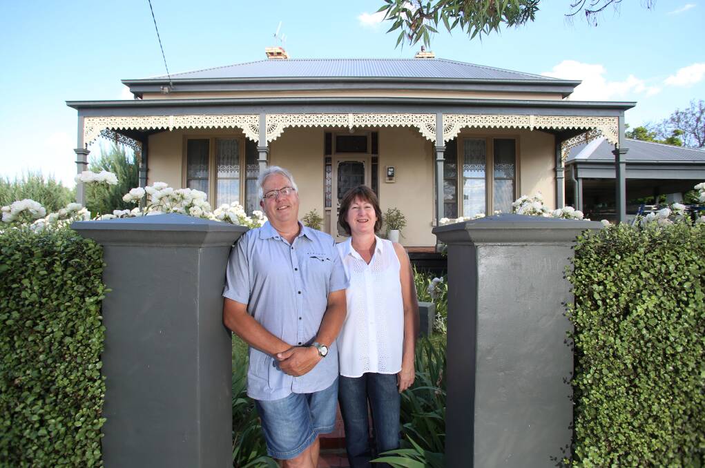 Russell and Julie Keating outside their home on Langston Street. Picture: PETER WEAVING