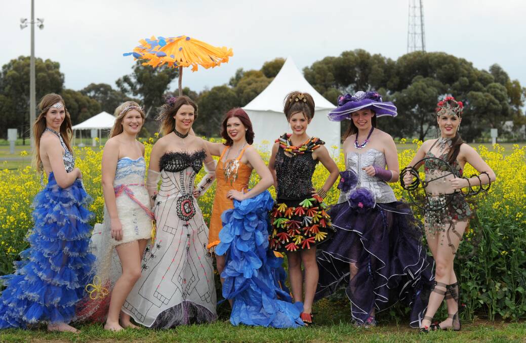 WHAT A FROCK: Models Kelsey Niven, Samantha Niven, Jaimee Tobin, Rhiana Micheel, Gabby Rosaia, Michelle Rogan and Bec Arnold wear entries in the Ag Art Wear Competition. Pictures: JODIE DONNELLAN 