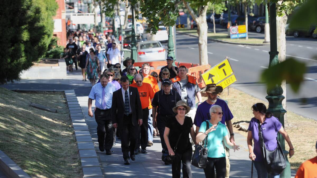Last year's White Ribbon Day march in Bendigo heads up View Street. Picture: JODIE DONNELLAN