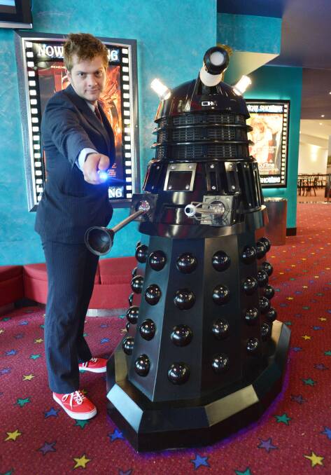 FAN: Michael Lister with Darren Hutchesson's Dalek. Picture: PETER WEAVING.