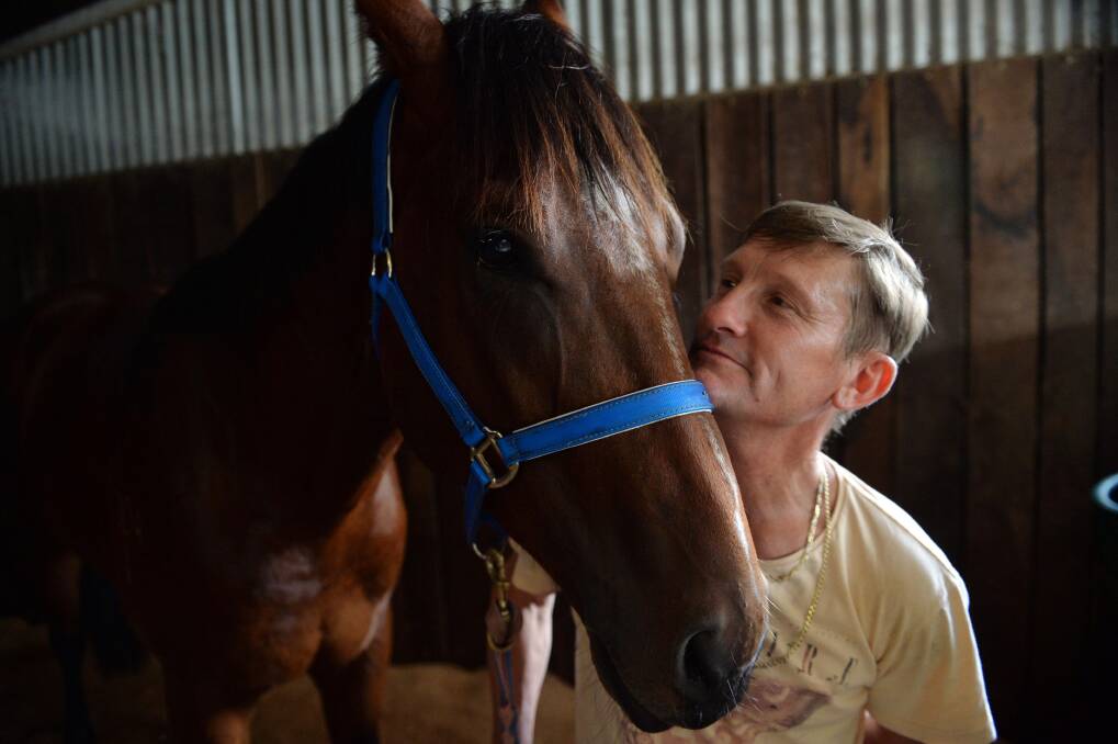 NEW HOME: Gus Philpot at his Bendigo stables with Lucky - a new addition to his team. Picture: BRENDAN McCARTHY