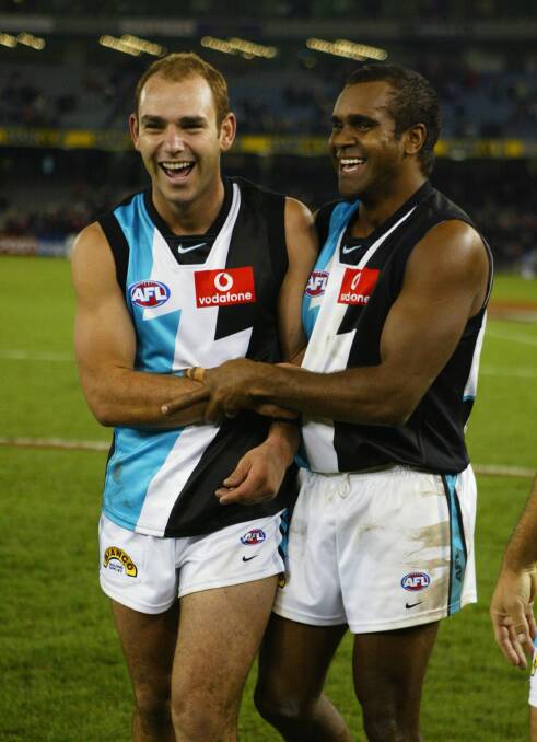 Good times with Byron Pickett after Port Adelaide defeated Essendon in round nine, 2003.