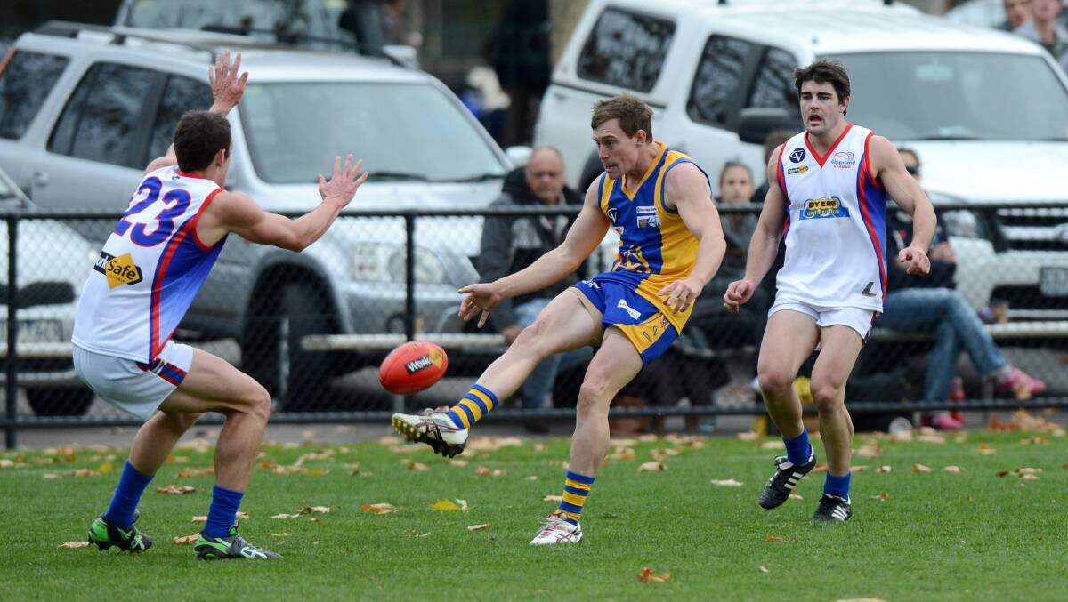 Sam Mildren snaps a goal for Bendigo in the win over Gippsland in 2012 at the QEO.