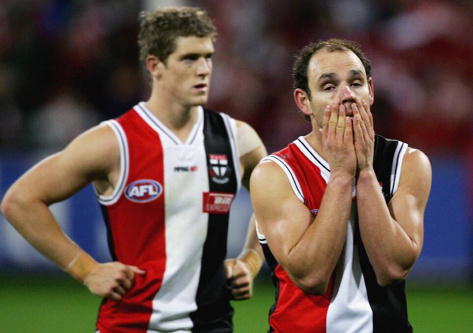 Sharing the pain of St Kilda's preliminary final loss in 2005 with Nick Dal Santo. Picture: GETTY IMAGES