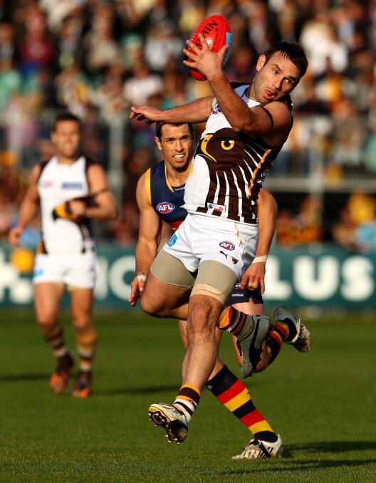 Taking a one-hander against the Crows in round 12, 2010. Picture: GETTY IMAGES