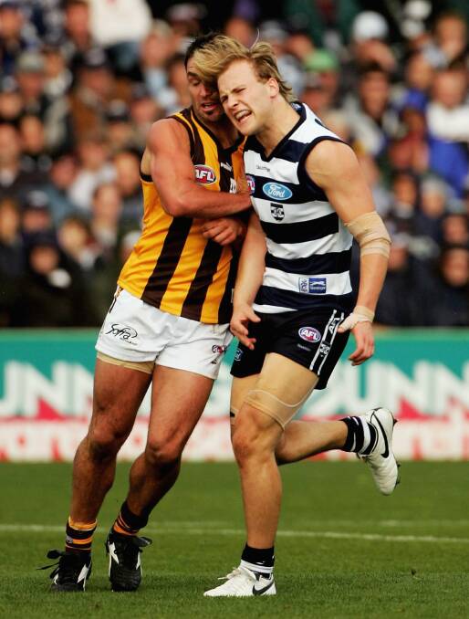 Head-to-head with Gary Ablett in 2006. Picture: GETTY IMAGES
