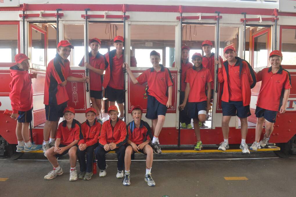 The South Australian boys aboard the tram.