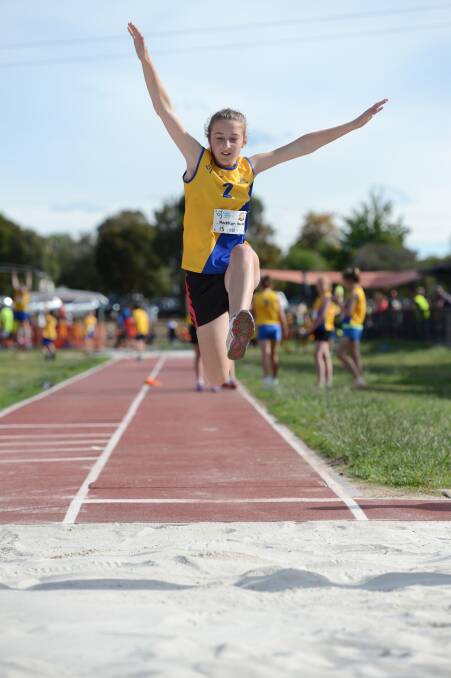 Maddison Hooke in the under-13 long jump.