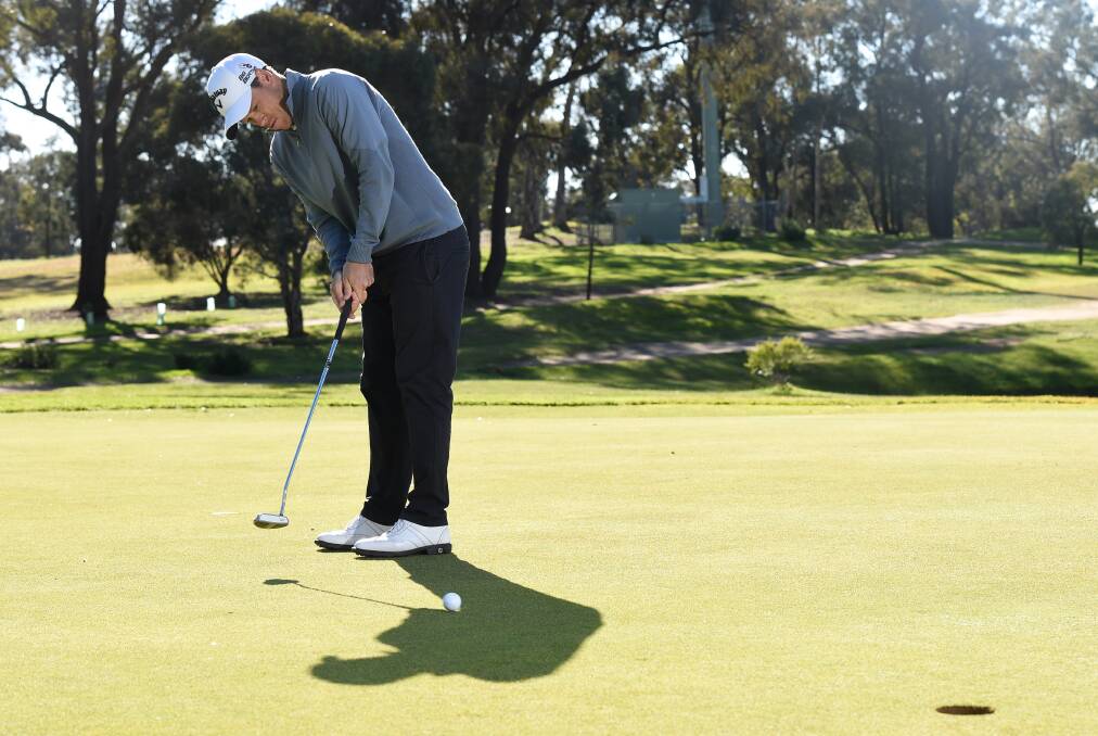 Andrew Martin works on his putting at Neangar Park. Picture: JODIE DONNELLAN