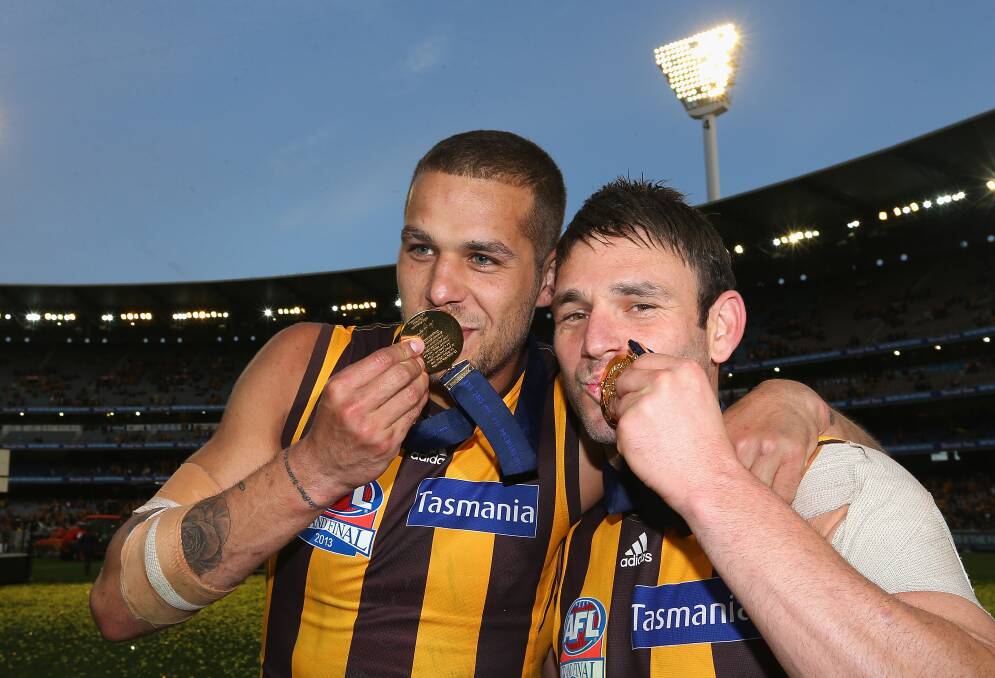 Buddy and Brent celebrate premiership glory. Picture: GETTY IMAGES
