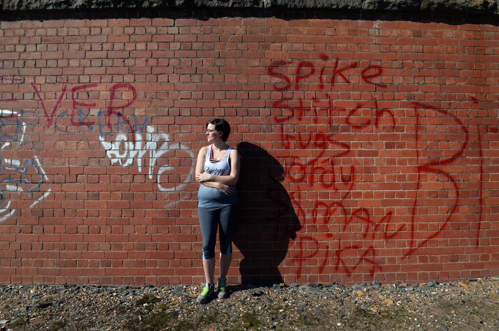 Karina Hughes wanting graffiti on the Eaglehawk overpass cleaned up. Picture: BRENDAN McCARTHY