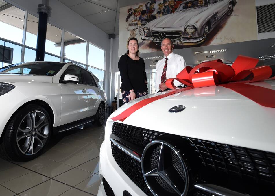 Arbonne independent consultant Sarah Hampton and Mercedes-Benz (Poyser Motors) sales consultant Peter Hyett. Picture: JODIE DONNELLAN 