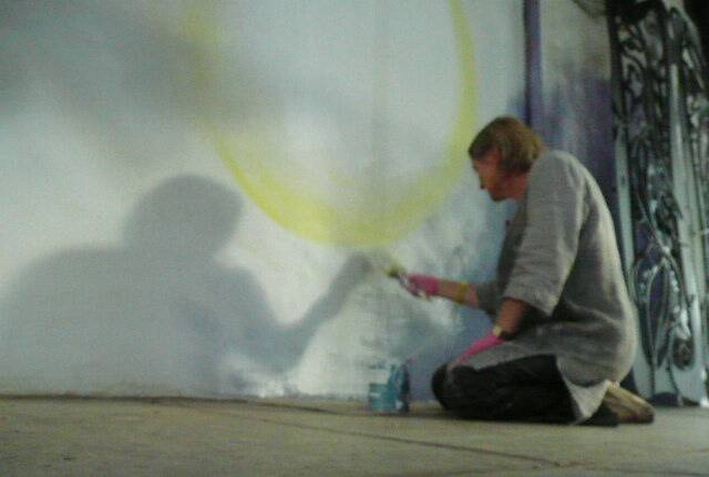 INSPIRED: Artist Julie Andrews working on the mural in Chancery Lane
Picture: BRENDAN McCARTHY
