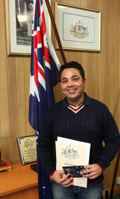 HAPPY: Raman Sharma at the citizenship ceremony in Serpentine.