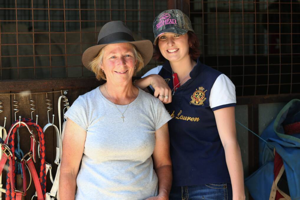 BACK IN THE SADDLE: Jennifer Williams and her jockey daughter Rebecca. Picture: PETER WEAVING