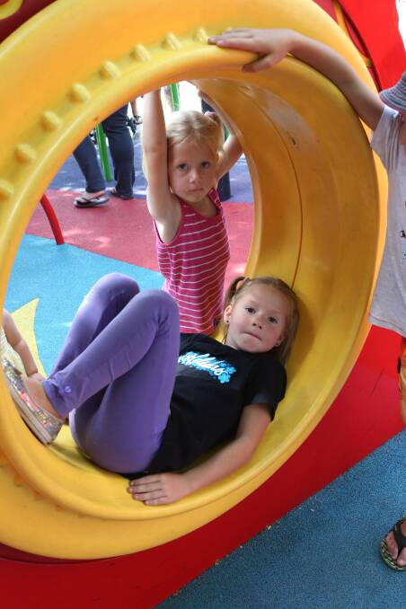 LOVING IT: Sienna Nelson, age 6, and Alliera Nelson, 4. Picture: PETER WEAVING.