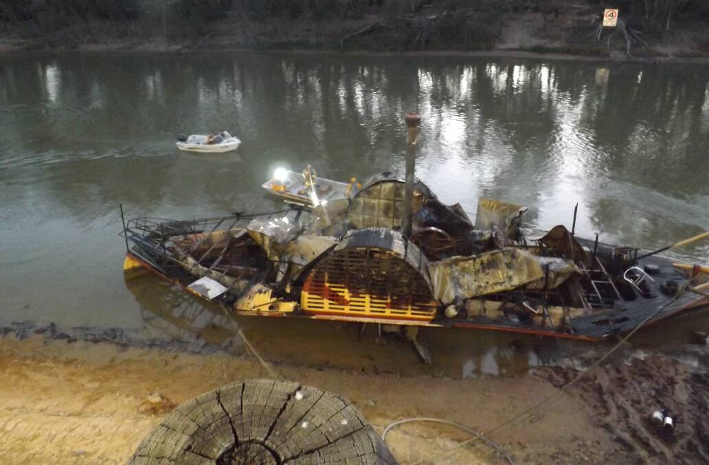 DESTROYED: The Henry Charles, which was destroyed by fire this morning. Picture: Courtesy of the Riverine Herald.