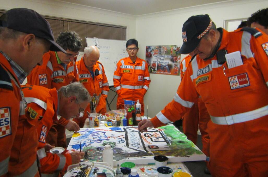  CREATING: Heathcote SES members participating in the project. Picture: CONTRIBUTED