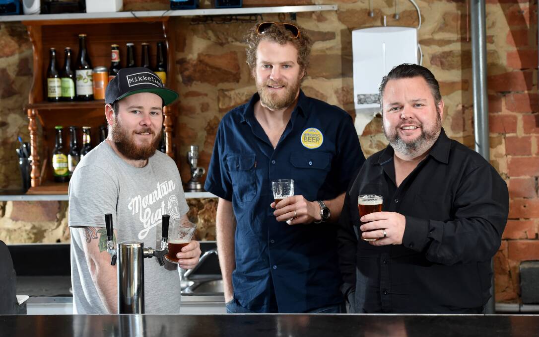 CHEERS: Goldmines general manager Justin McPhail, Bendigo Beer committee member Pete Martin and competition co-organiser Scott Seymour. Picture: JODIE DONNELLAN