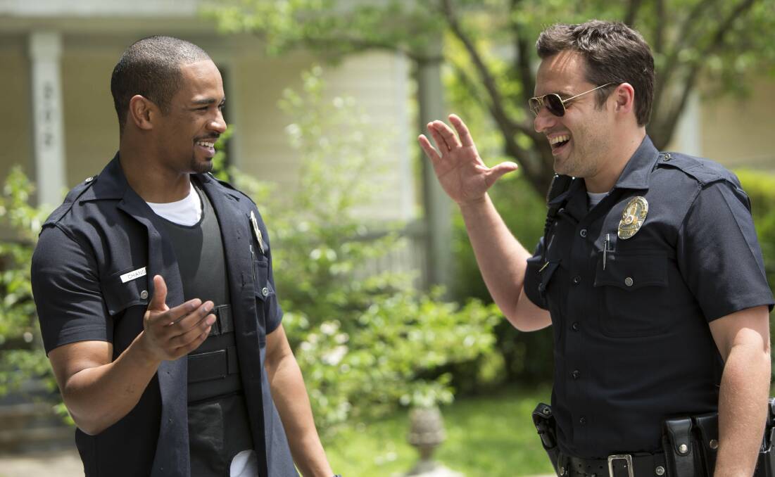 PARTNERS: Damon Wayans Jr and Jake Johnson dress up as policeman for Let's Be Cops.