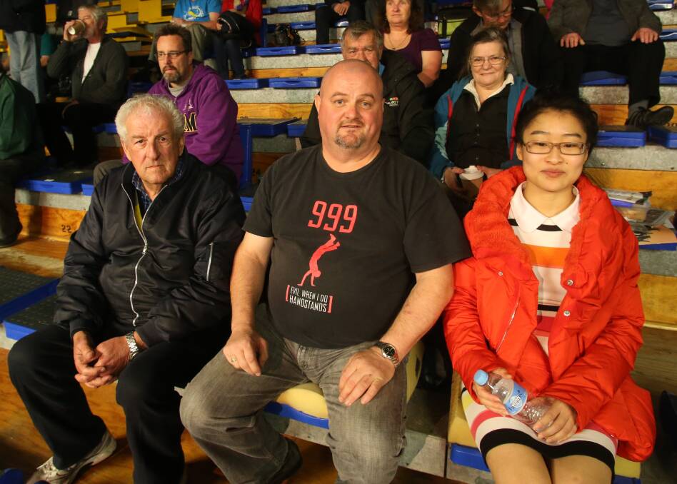 FANS: Eddi Creswell, Neil Allison and Bunny Bu watch the snooker on Thursday night. Picture: PETER WEAVING