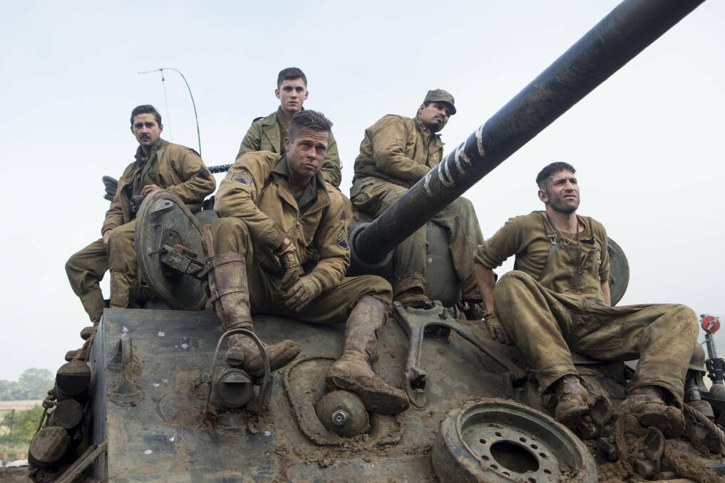 TEAM: Brad Pitt leads and army tank crew in Fury.