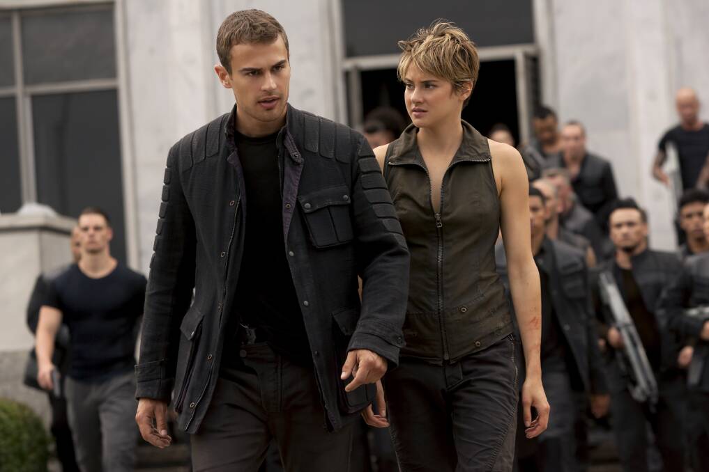ON THE RUN: Four (Theo James) and Tris (Shailene Woodley) are fugitives in Insurgent.