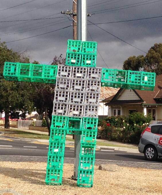 ENIGMA: Crate Man was spotted at the Keck Street and Neale Street roundabout on Friday. Picture: SUPPLIED