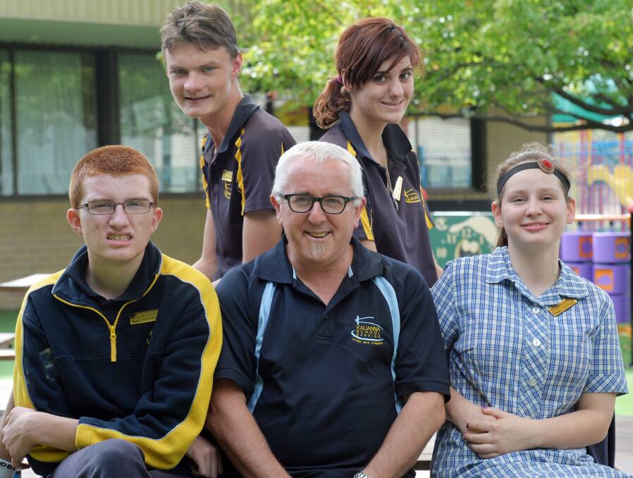 PASSION: Kalianna principal Peter Bush with this year's school captains Jarrod Stephens and Charmaine Haylock, front, and vice captains Travis Bryan and Jenifer Mustard, back. Picture: BRENDAN McCARTHY