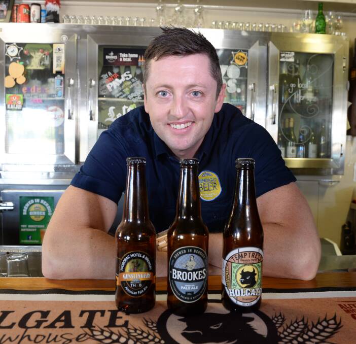 ALES: Trevor Birks with three locally brewed and owned beers. Picture: LEIGH SHARP