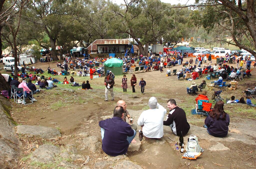 The crowd at the base of Mt Tarrengower enjoying the Maldon Folk festival. 
pic by Bill Conroy 30/10/05