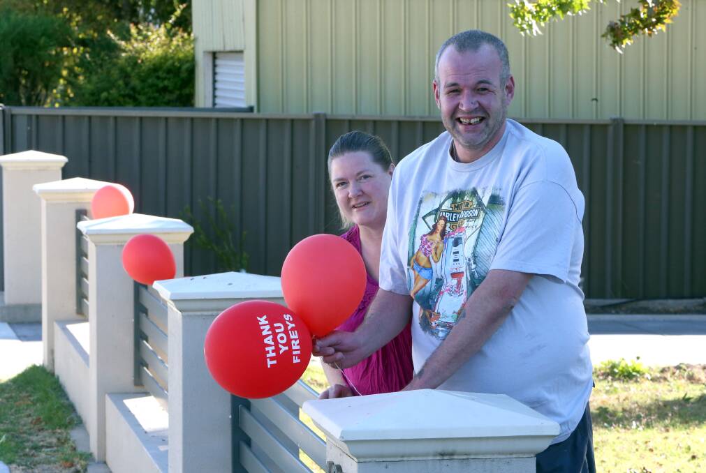 Sharon Letts and Damien Conquit with balloons.
Picture: Peter Weaving