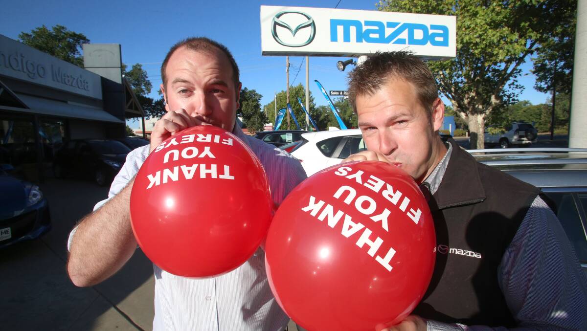 Mazda staff Dav Wright and Boyd Blythman.
Picture: Peter Weaving