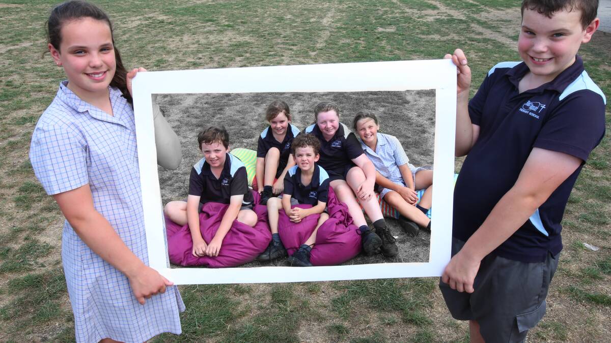 Holy Rosary PS are holding a Movies on the Green event at the school on Friday night.Hold the giant screen Holly and Jackson Fletcher, lying down are Zac, Elizebeth and Mathew Roberts, Isobella Tuohey and Ashlee Ilott. Photo Peter Weaving 250213