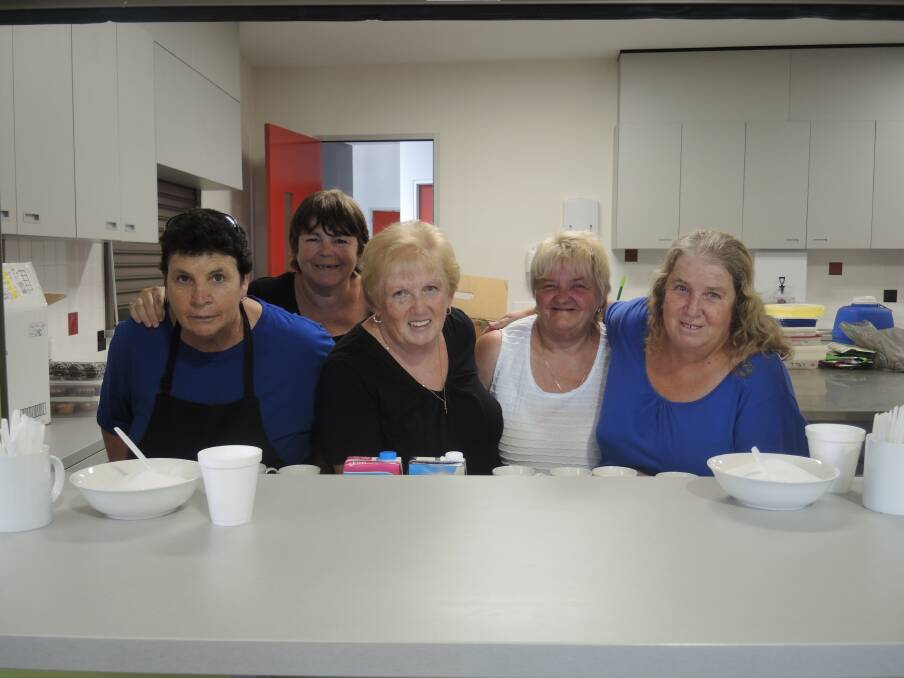 A HELPING HAND: Volunteers Sheayl Apps, Narelle James, Shirley Purcell, Karen Cornwill and Karen Apps.