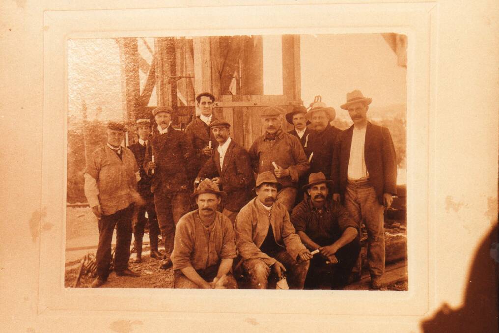 William Henry Wilkie mining in Bendigo. front center with candle.