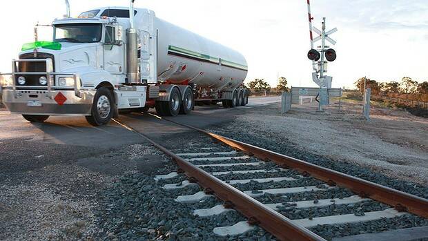 Action urged: The level crossing where the crash occurred. Photo: Melanie Faith-Dove