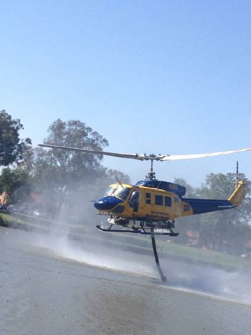 QUICK RESPONSE: The firefighting helicopter has made several trips to Lake Weeroona this morning. PICTURE: Supplied.