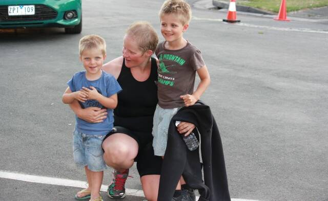 HAPPY MUM: Lisa McDermid with sons Jonty, 2, and Avery, 5, after completing the Echuca triathlon.