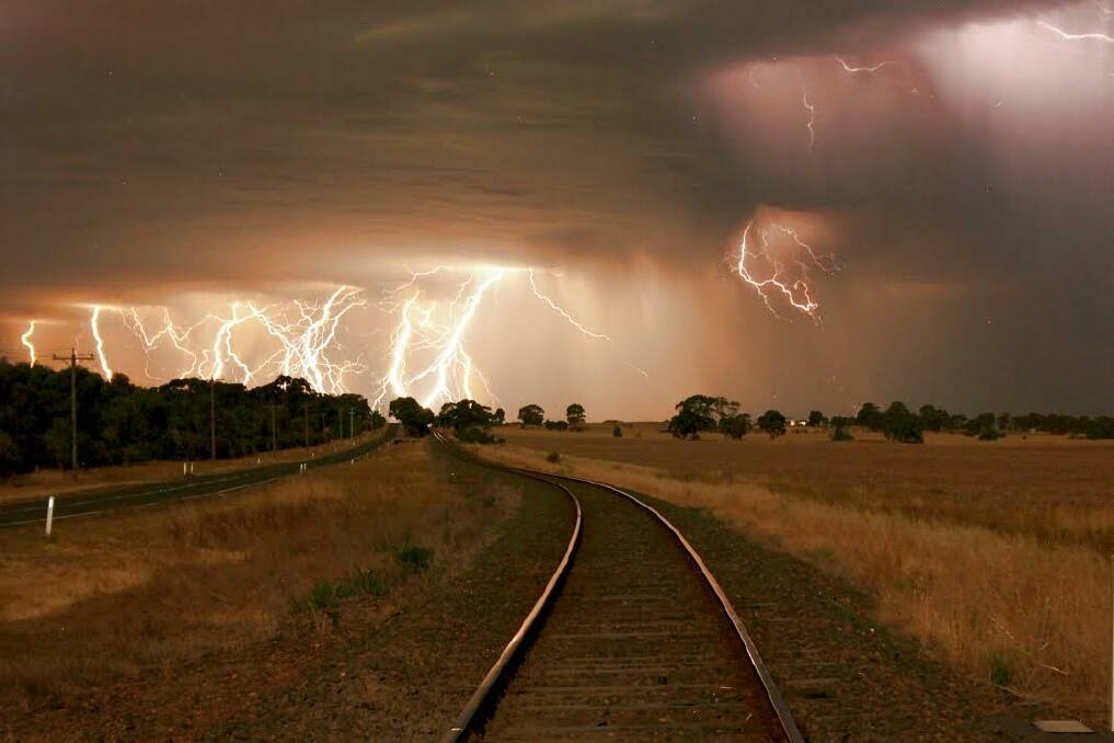 LIGHTNING CRASHES: Kylie Epskamp captured multiple lightning strikes near a railway line