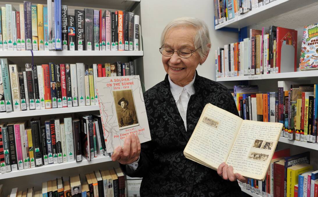 RARE DIARY: Castlemaine's Joan Scott shows off the published version (left) of the original diary (right). Picture: JULIE HOUGH