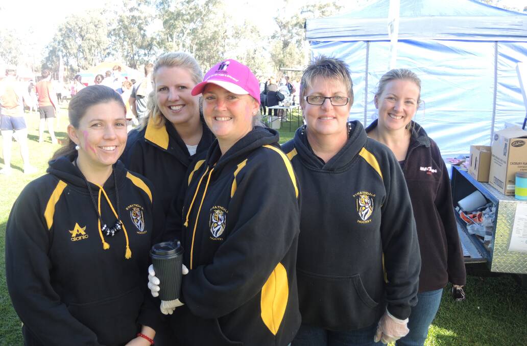 From left, Melissa Nicholson, Nicole Hood, Sally Anderson, Jill Miles and Pam Mawson volunteered at the Strathdale Hockey Club stand. Picture: GEORGINA HOWDEN-CHITTY