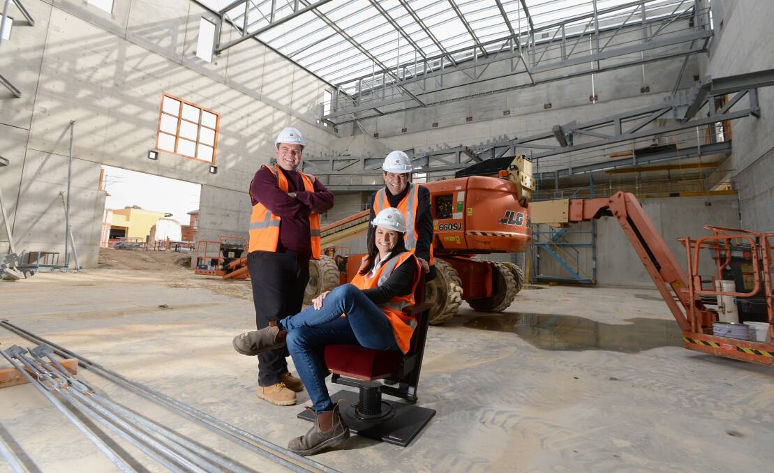 TAKE A SEAT: City of Greater Bendigo's David Lloyd, Renee Norris and Stan Liacos at the new Ulumbarra Theatre site. Picture: JIM ALDERSEY
