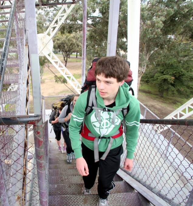 TRAINING: Zac Holden, 18, hiking up the poppet head in Rosalind Park. Picture: GLENN DANIELS