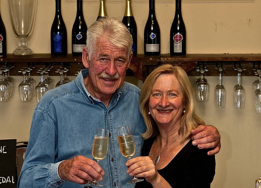CELEBRATE: Winemakers John Boucher and Pauline Russell, of Kyneton Ridge Estate, toast to their success. Picture: CONTRIBUTED