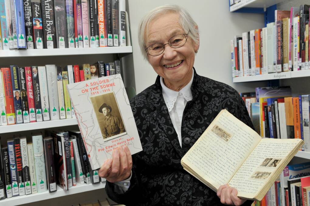 TREASURE: Castlemaine's Joan Scott shows off the published version (left) of the original diary (right). Picture: JULIE HOUGH