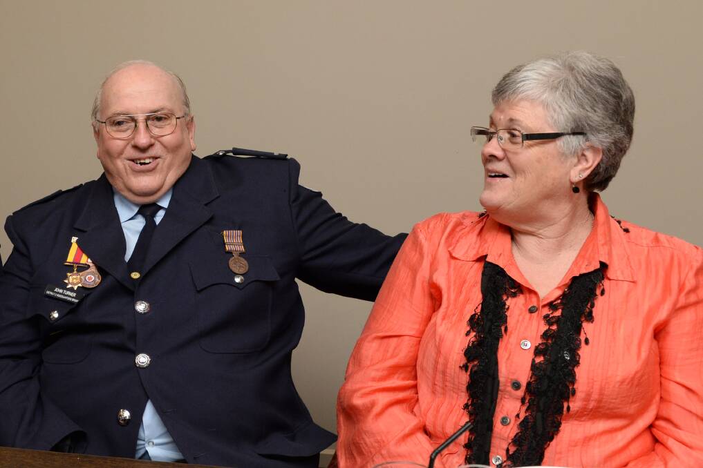 FIREFIGHTER: John Turner with wife Ruth Turner. Picture: JIM ALDERSEY