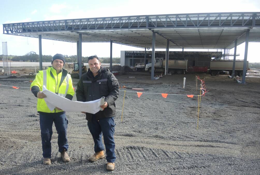 ON SITE: Peter Petrellis and Nick Tzaferis at the new service station at Ravenswood. Picture: LEIGH SHARP
