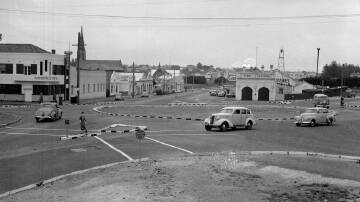 Traffic using new roundabout Princes Highway West Warrnambool  in 1956. The site of the Tattersalls Hotel on Liebig Street is now occupied by McDonald's.