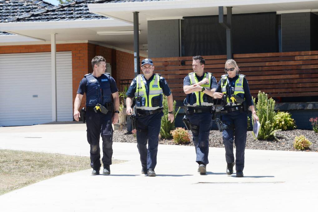 OPERATION: Police in the Kangaroo Flat area as part of a search for Muoi Thai, who fled a house where a significant cannabis-growing operations was discovered on January 7 last year. Picture: DARREN HOWE